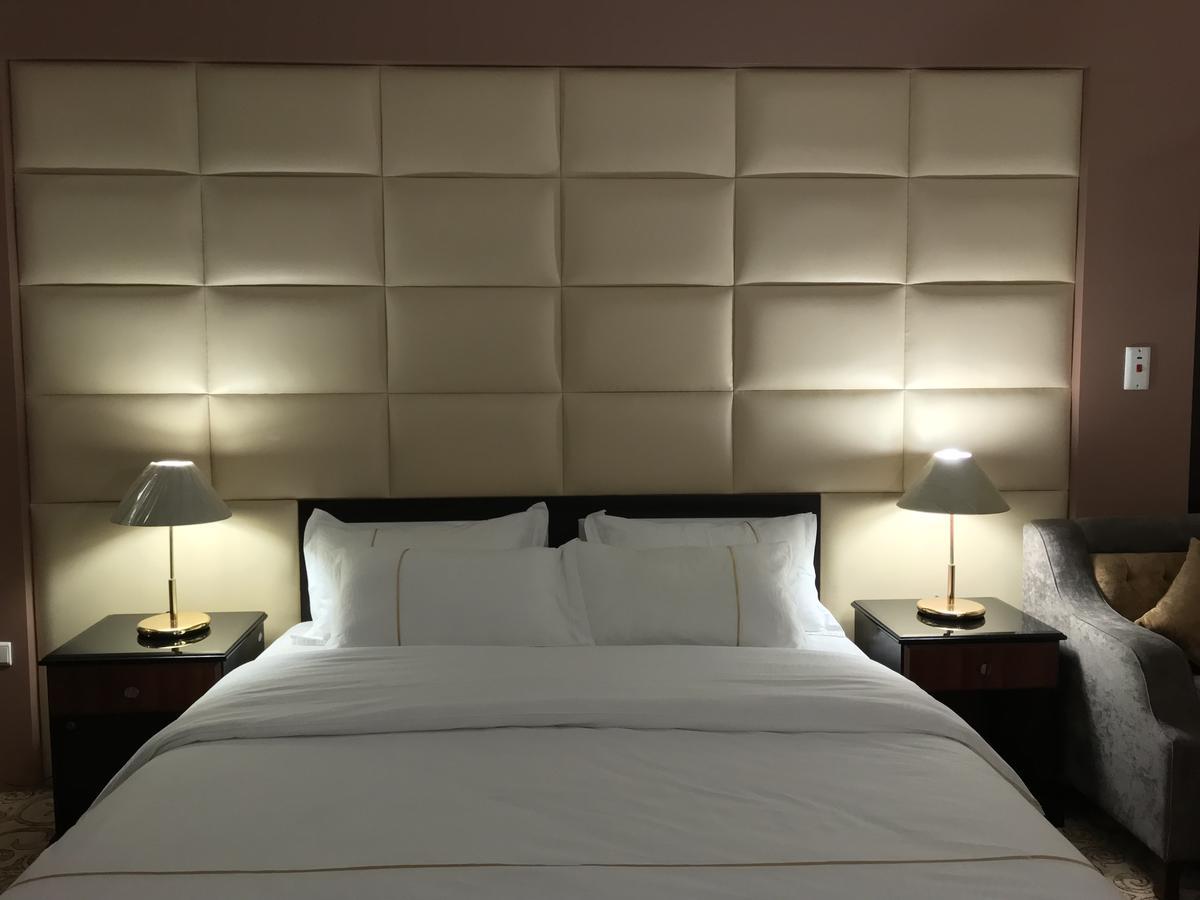 Dama Hotel Duba Habitación foto